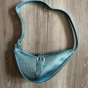Metallic blue saddle bag